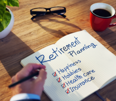 Man handwriting retirement checklist