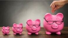 Increasingly large piggy banks; depositing into largest