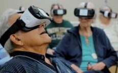 Older people looking through VR googles
